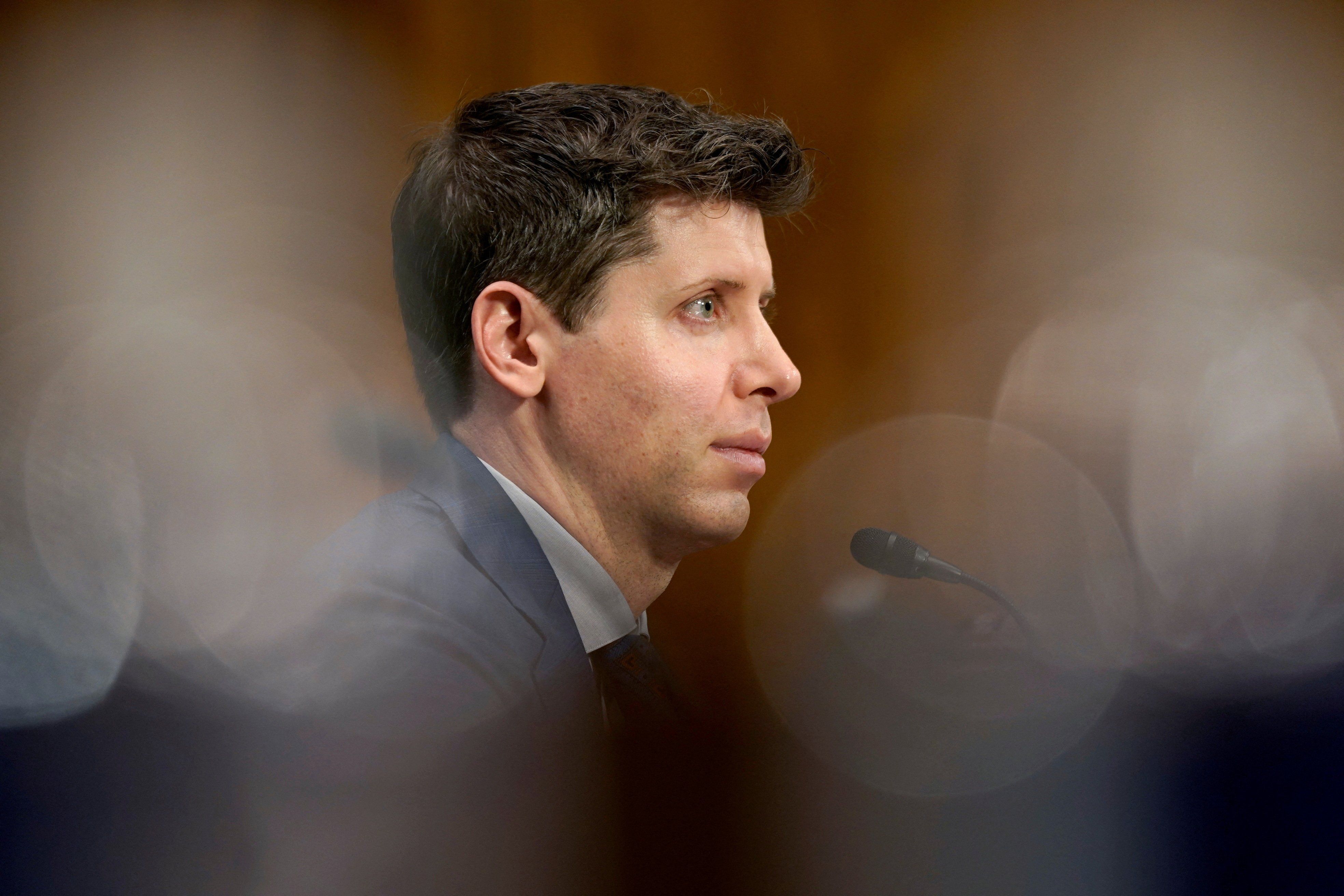 Sam Altman, who has just been ousted as CEO of OpenAI, is seen here testifying before a Senate Judiciary Privacy, Technology & the Law Subcommittee back in May 2023.