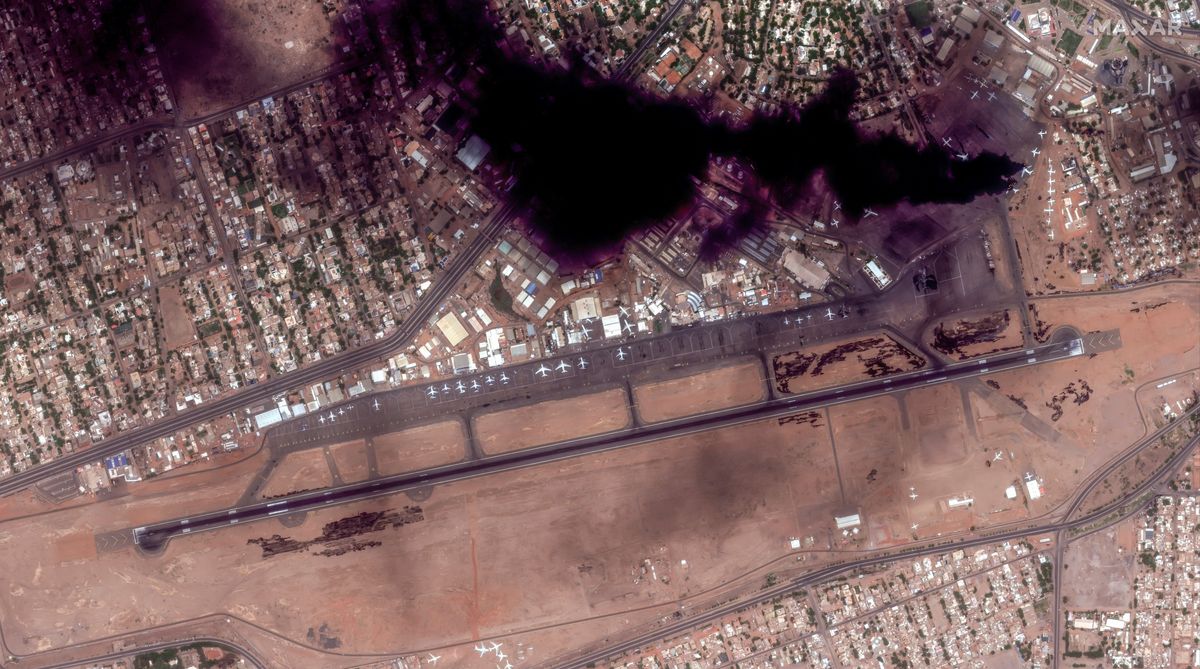 Satellite image shows smoke and an overview of Khartoum International Airport in Sudan.