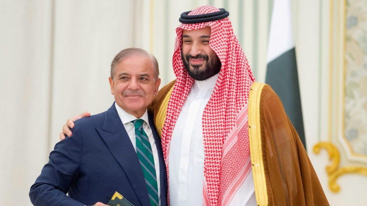Saudi Crown Prince Mohammed bin Salman and Pakistan Prime Minister Shehbaz Sharif embrace each other on the day they sign a defence agreement, in Riyadh, Saudi Arabia, September 17, 2025.