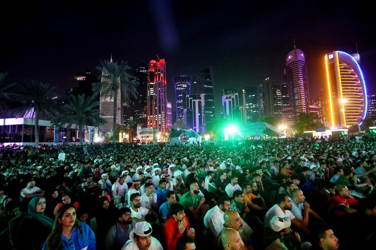 Saudi fans watching the World Cup first-round match against Poland at a fan zone in Doha.