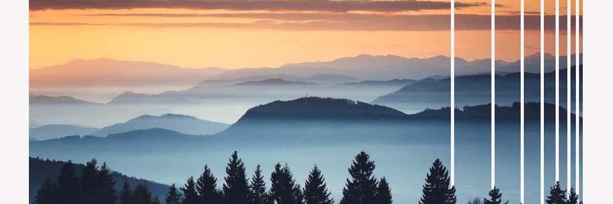 Scenic photograph of mountains during sunset