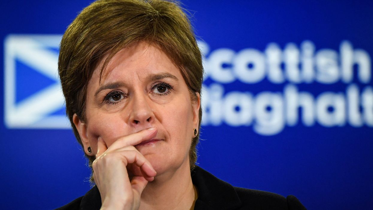 Scotland's First Minister Nicola Sturgeon reacts during a press conference at St Andrews House in Edinburgh.