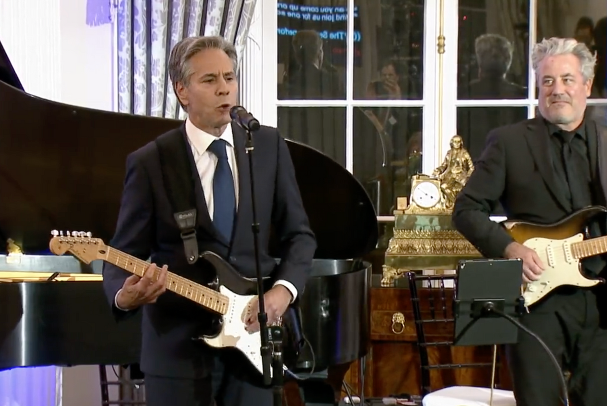 Secretary of State Antony Blinken plays guitar at the State Department, September 27, 2023.
