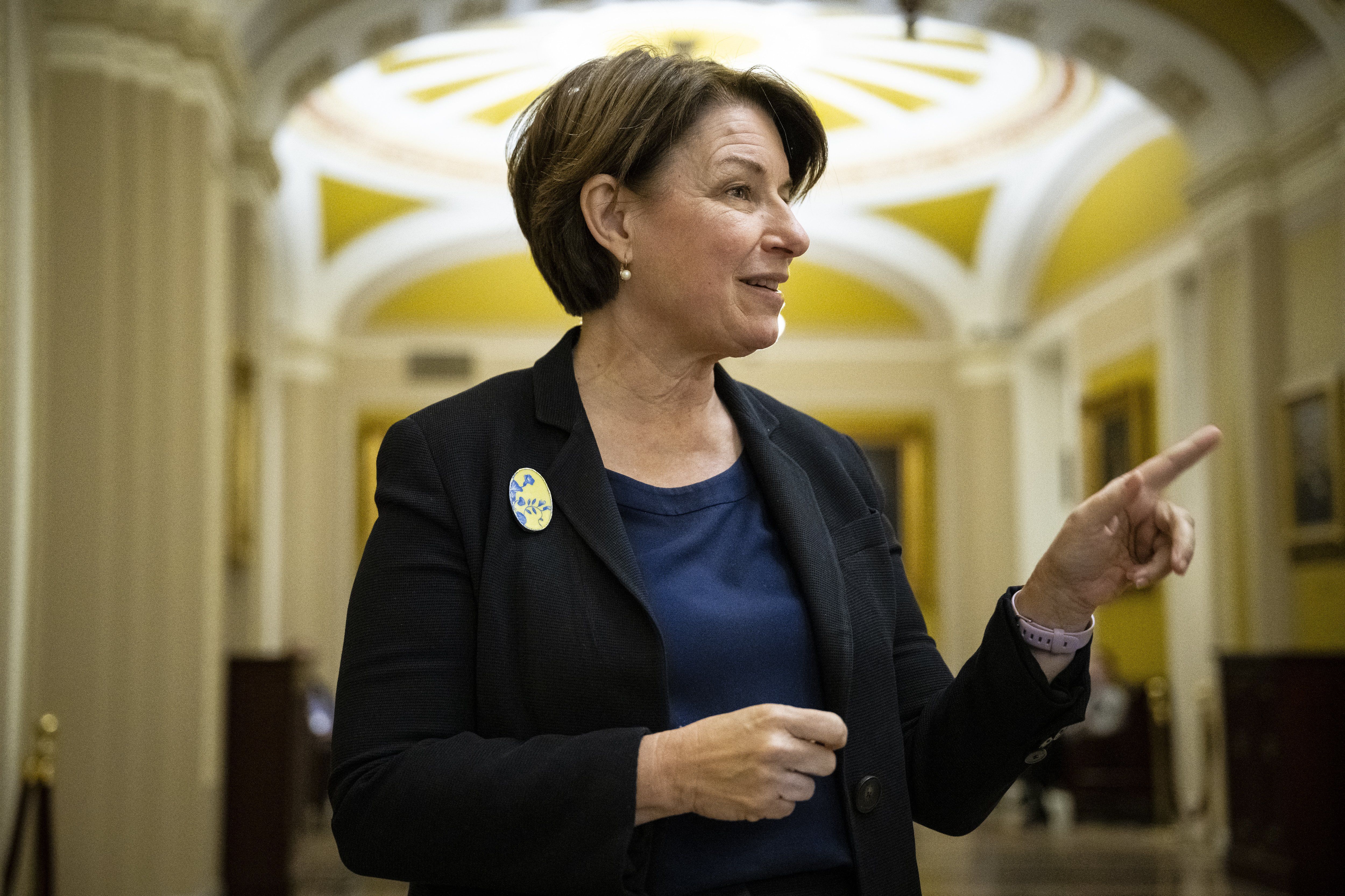 ​Sen. Amy Klobuchar (D-MN) speaks to media near the Senate Chamber during a vote at the US Capitol, in Washington, D.C., on Wednesday, Nov. 15, 2023.