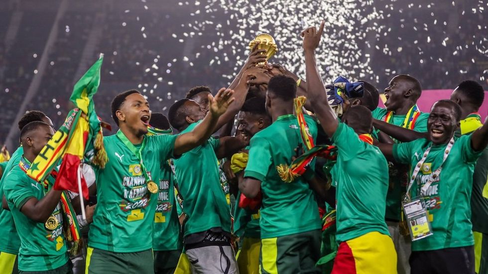 Senegal's national team celebrates after winning AFCON in Feb. 2022.