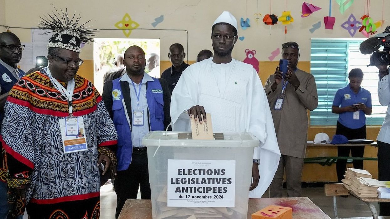 Senegal's Presidential Bassirou Diomaye Faye casts his ballot during the early legislative election, at a polling station in Ndiaganiao, Mbour, Senegal on Nov. 17, 2024.