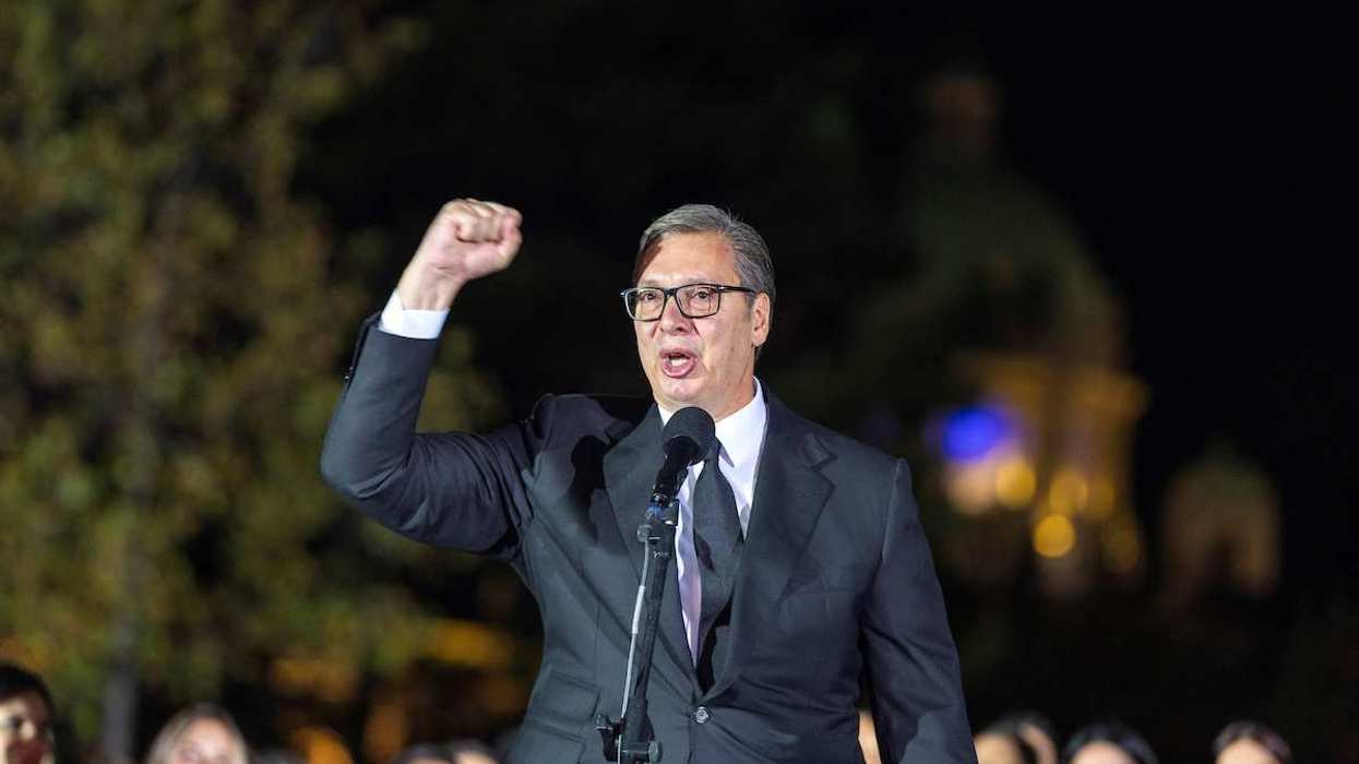 Serbian President Aleksandar Vucic waves to citizens outside the Presidency of Serbia moments before formally submitting his resignation, ending his second and final five-year term in office, in Belgrade, Serbia.