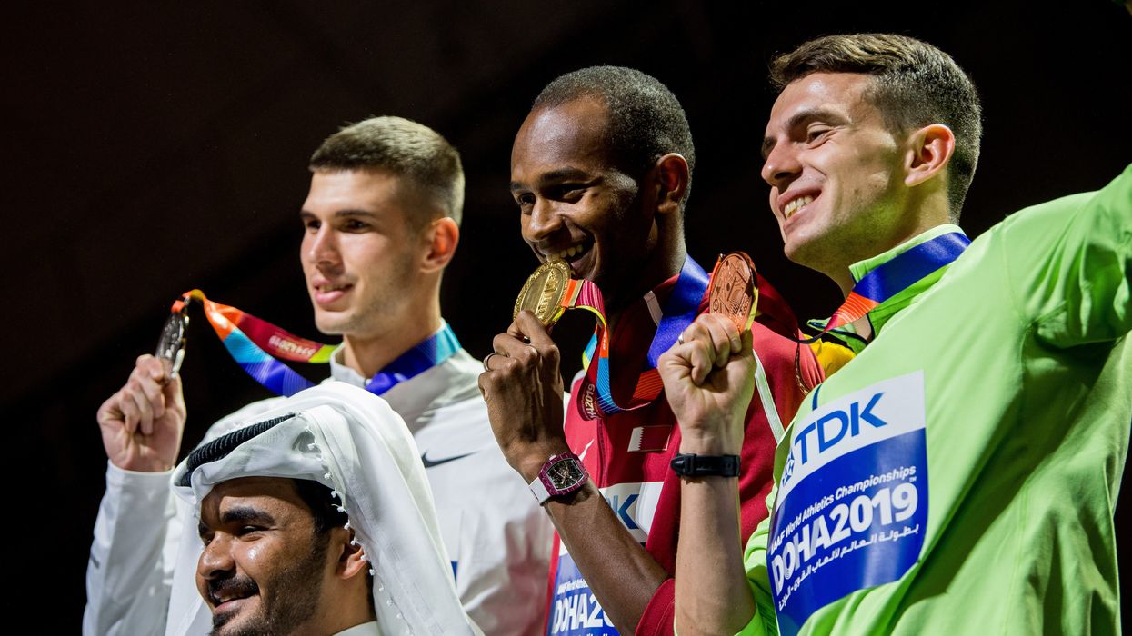 Sheikh Joaan bin Hamad Al Thani, President of the Qatar Olympic Committee, Mikhail Akimenko of Authorised Neutral Athlete (ANA), Mutaz Essa Barshim of Qatar and Ilya Ivanyuk of ANA at the medal ceremony.