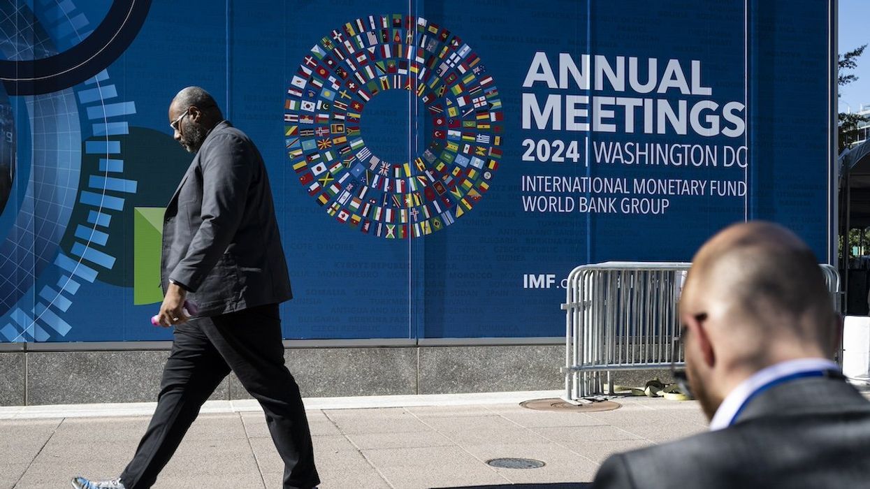 Signage for the International Monetary Fund (IMF) and World Bank Group (WBG) 2024 Annual Meetings is seen at the IMF secondary headquarters, in Washington, D.C., on Monday, October 21, 2024.