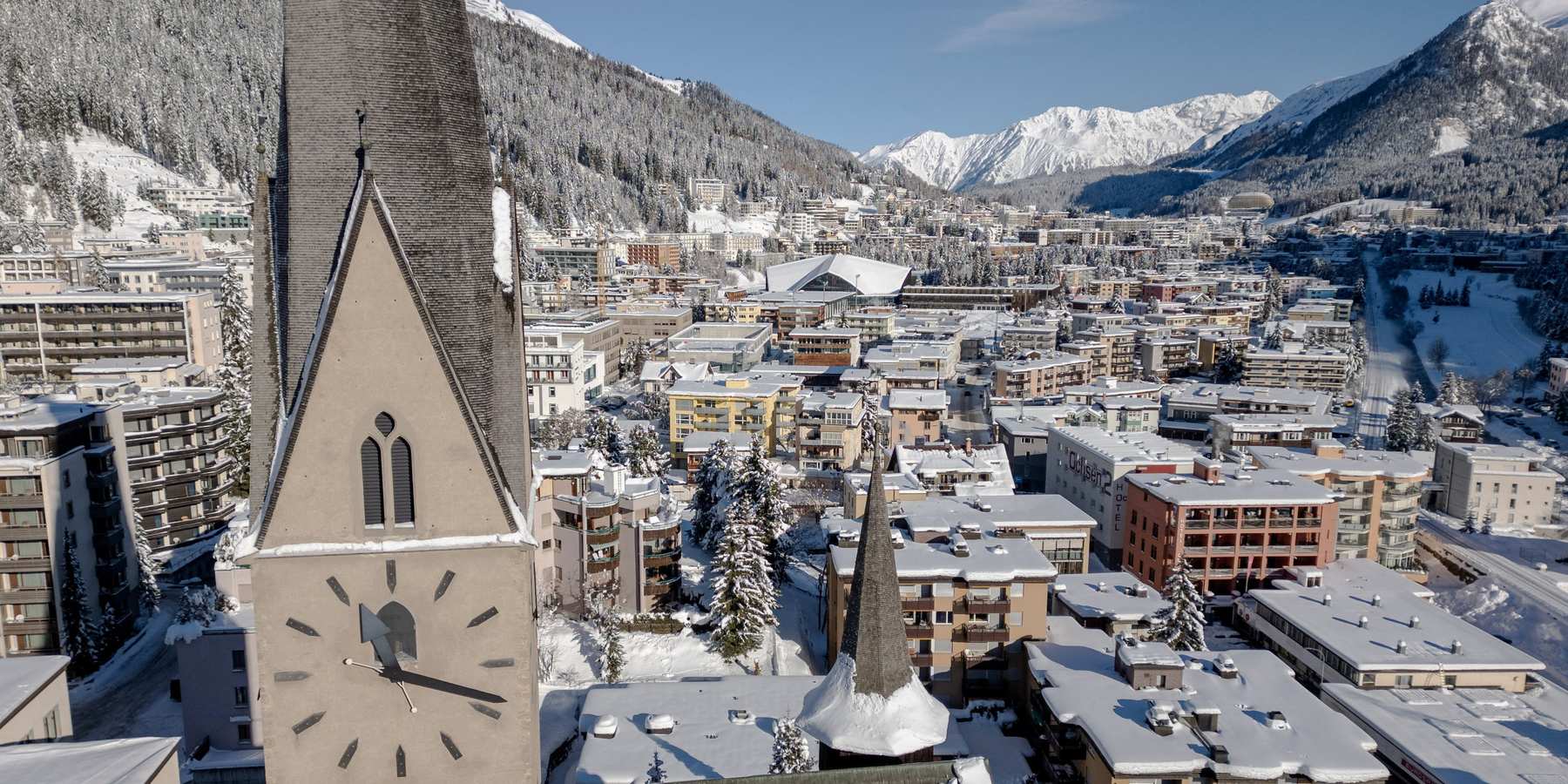 Skyline view of Davos, Switz., with the St. Johann church in the foreground.