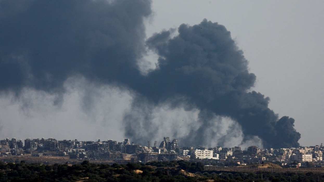 Smoke billows after an explosion in northern Gaza, amid the ongoing conflict between Israel and the Palestinian Islamist group Hamas, as seen from Israel, May 12, 2024.