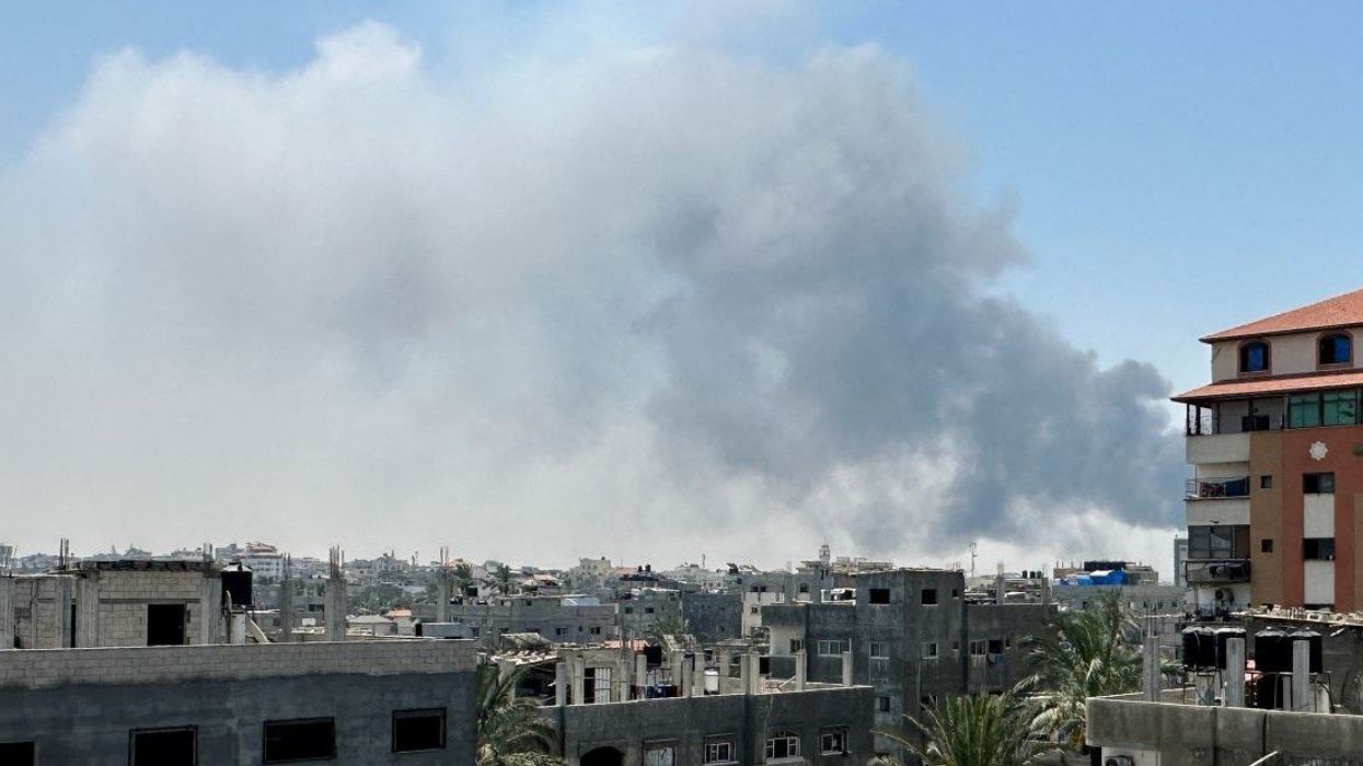 Smoke rises during Israeli strikes amid the Israeli military operation in Deir Al-Balah, in the central Gaza Strip, July 21, 2025.