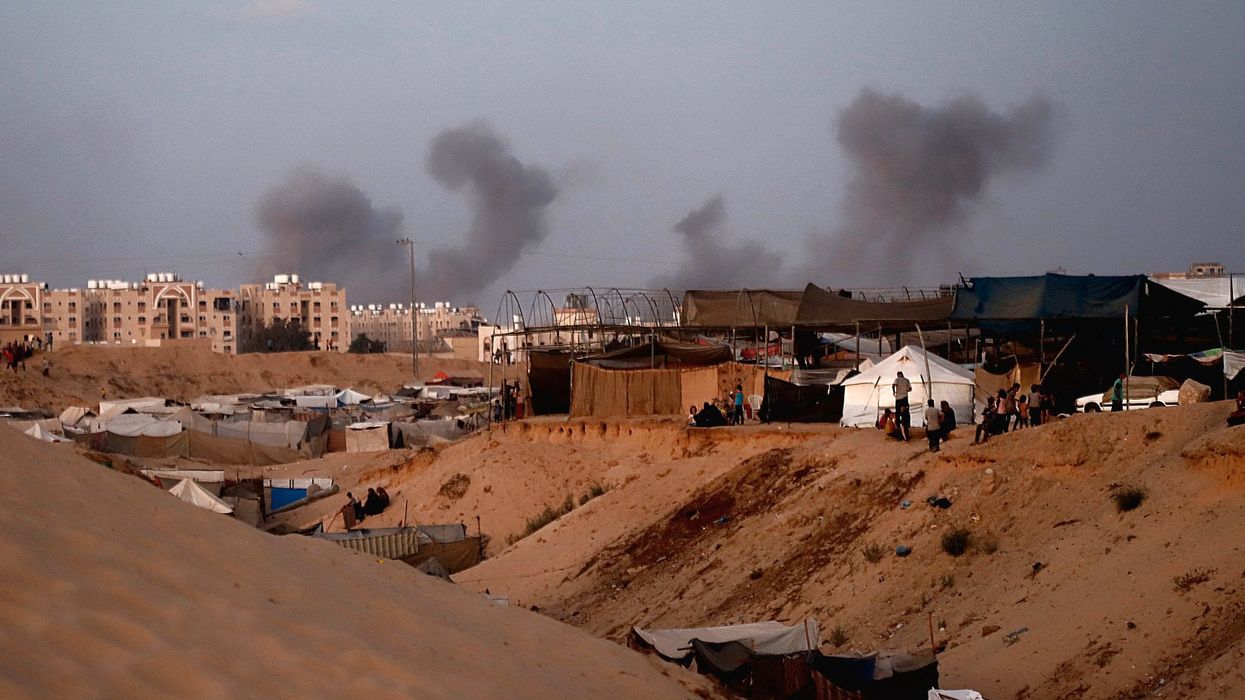 Smoke rises from the vicinity of the Hamad Towers area, west of Khan Younis, Gaza trip, August 14, 2024.
