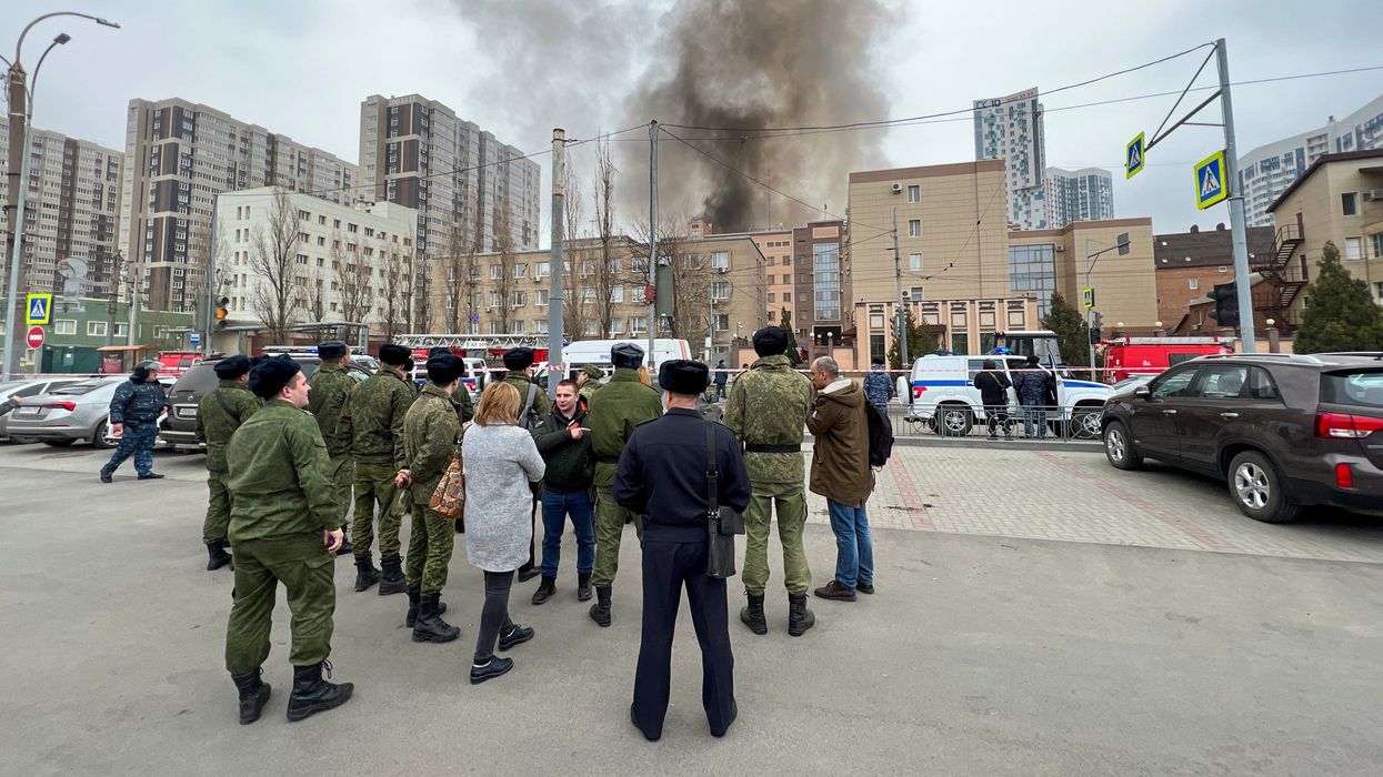 Smoke rises near a building belonging to the border patrol section of Russia's FSB federal security service in the southern city of Rostov.