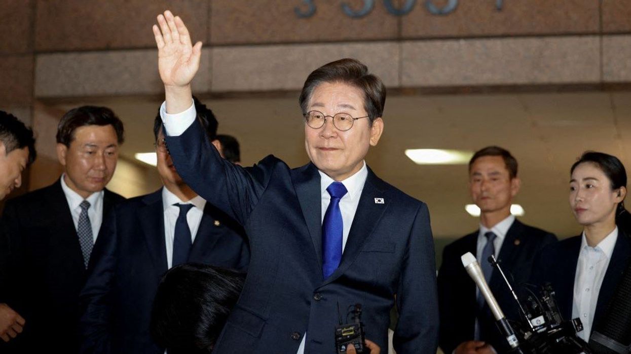 South Korea's President-elect Lee Jae-myung waves as he leaves to meet his supporters, in Incheon, South Korea, June 3, 2025.