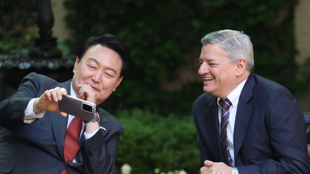 South Korean President Yoon Suk Yeol meets with Netflix co-CEO Ted Sarandos during a news conference in Washington, DC.