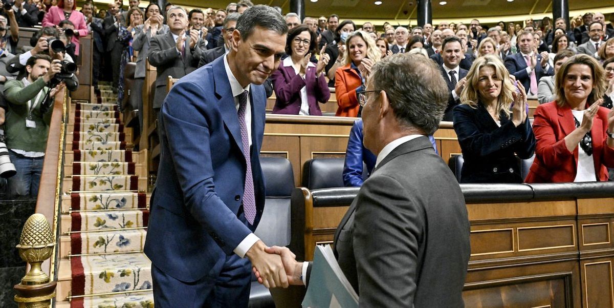 Spain's newly re-appointed Prime Minister Pedro Sanchez is congratulated by People's Party leader Alberto Nunez Feijoo, at the Spanish parliament in Madrid, Spain, November 16, 2023. 