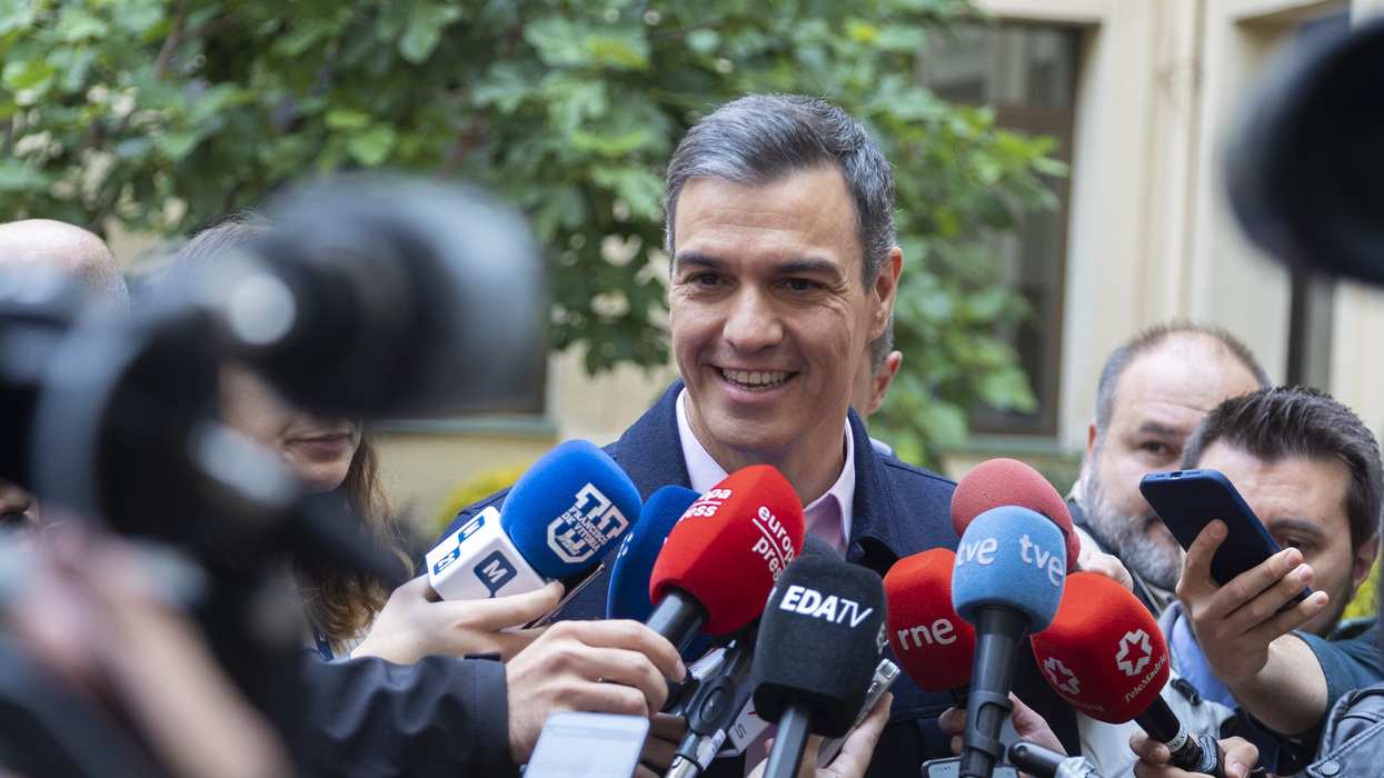 Spanish PM Pedro Sánchez addresses the media after casting his vote in the municipal and regional elections in Madrid.