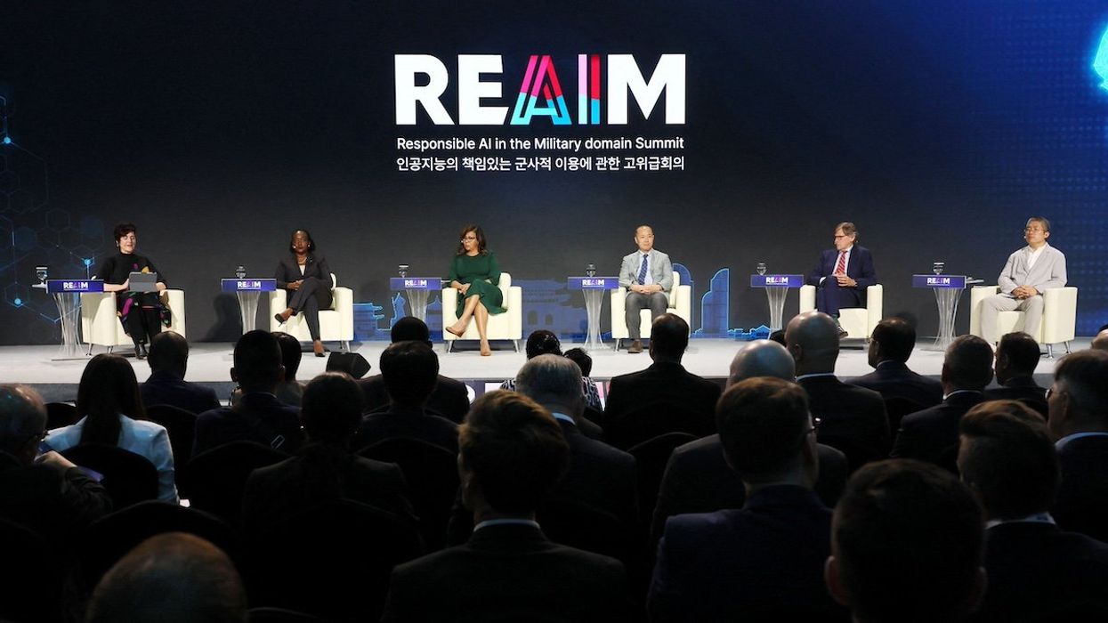 Speakers including Dr. Radha Plumb, Chief Digital and Artificial Intelligence Officer, U.S. Department of Defense (third from left), discuss responsible AI use in a plenary session at the Responsible AI in the Military domain (REAIM) summit in Seoul, South Korea, September 9, 2024.