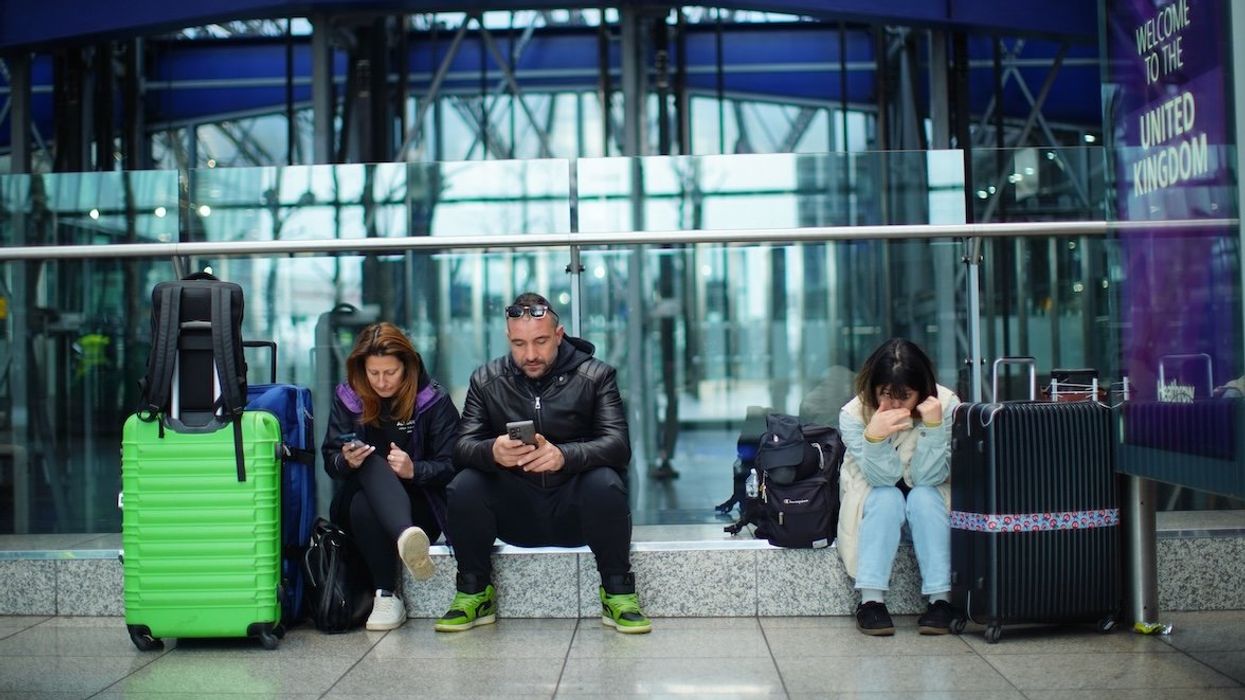 Stranded passengers at Heathrow Terminal 5 in London on Friday, March 21, 2025.