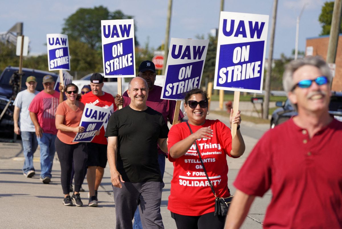 Striking UAW workers picket outside a Stellantis facility in Center Line, Michigan, on Sept. 22, 2023. 