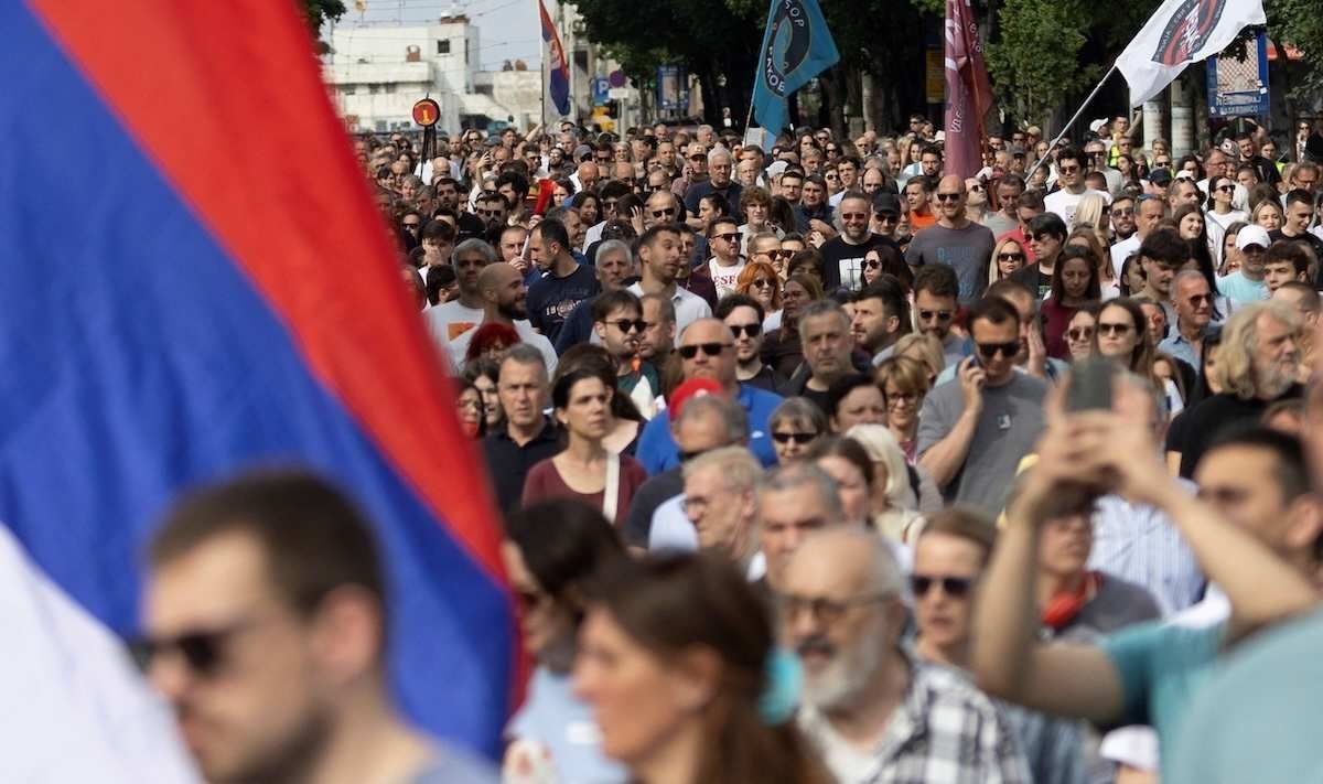 ​Students and their supporters take part in a protest in Serbia
