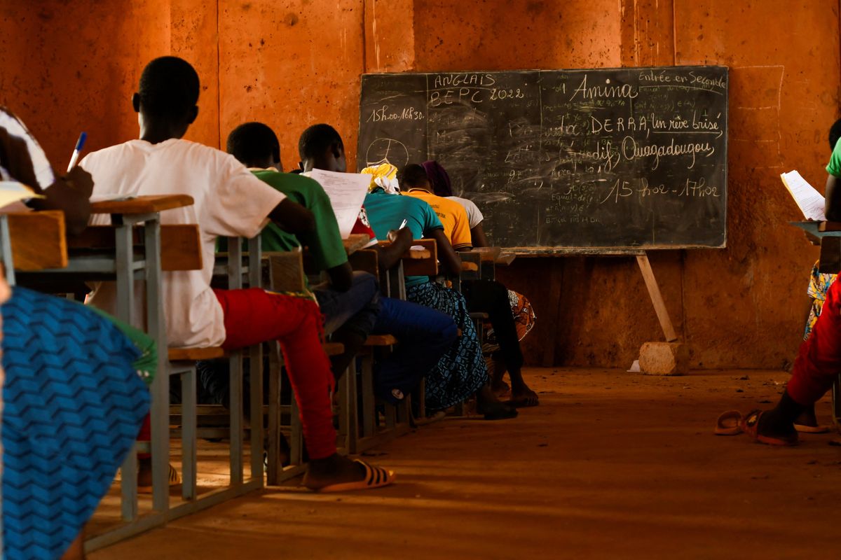 Students attend their final exam at the secondary school in Burkina Faso
