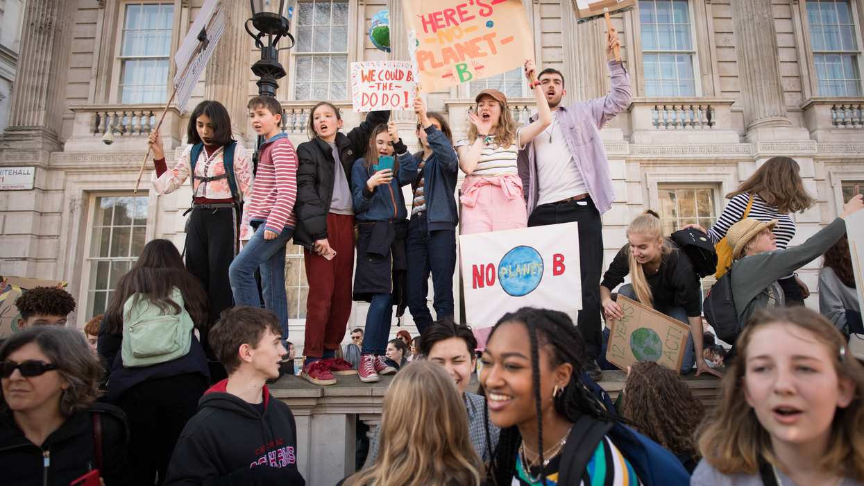 Students from the Youth Strike 4 Climate movement during a climate change protest on Parliament Square in Westminster, London. Reuters