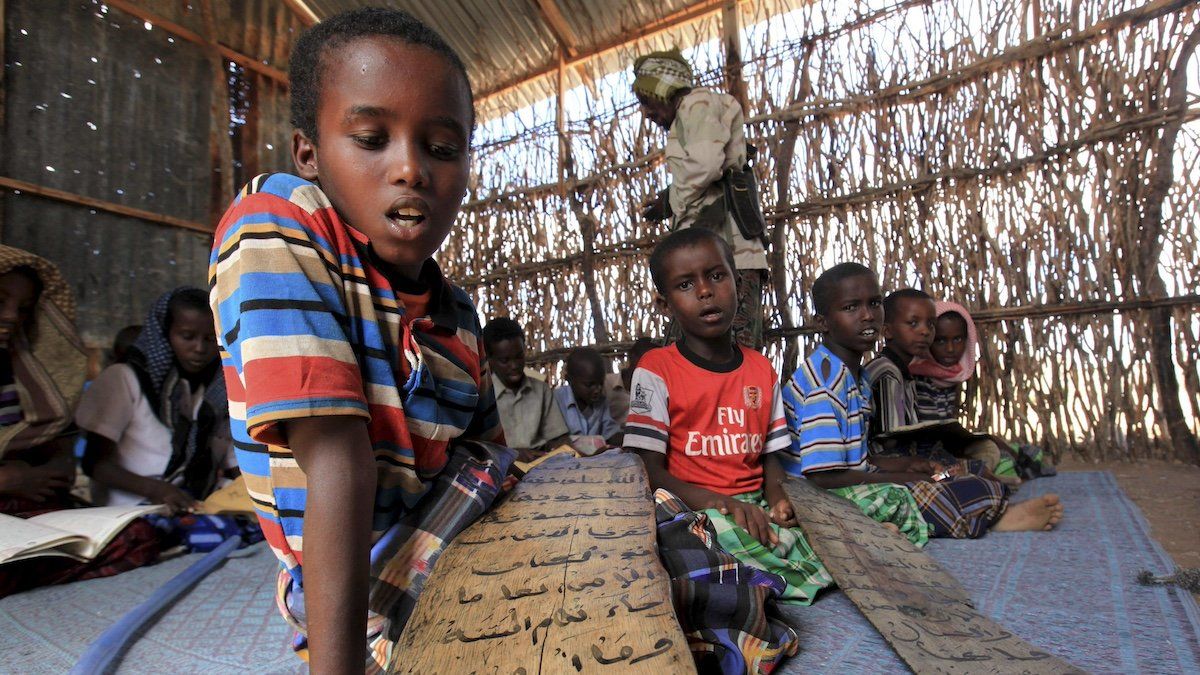 Students read Koranic verses at a madrasa, or Koranic school, in Dhusamareeb, central Somalia, December 16, 2012. 