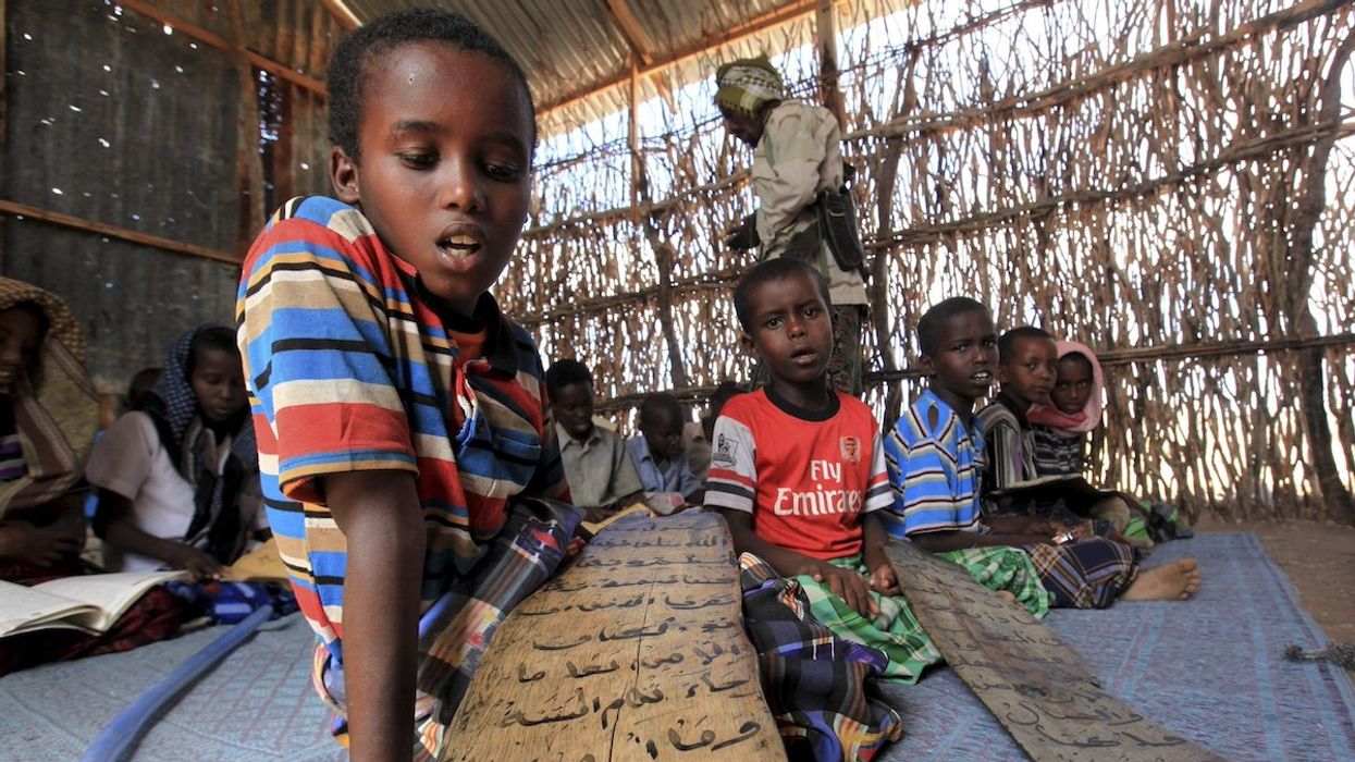 Students read Koranic verses at a madrasa, or Koranic school, in Dhusamareeb, central Somalia, December 16, 2012.
