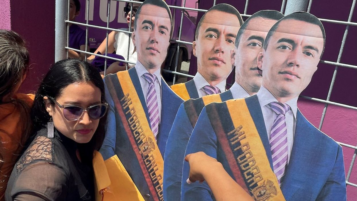 Supporters hold cardboard cutouts of Ecuadorian President Daniel Noboa, days before the Ecuadorian presidential election, in Guayaquil, Ecuador, on Feb. 4, 2025.