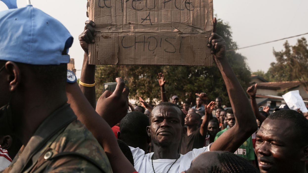 Supporters of CAR President Faustin-Archange Touadera celebrate after the high court confirms his reelection in the capital, Bangui. REUTERS/Antoine Rolland