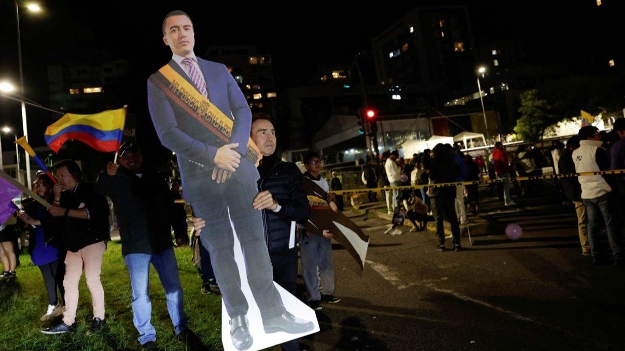 Supporters of Ecuador's President Daniel Noboa celebrate his win in Quito, Ecuador, on April 13, 2025.
