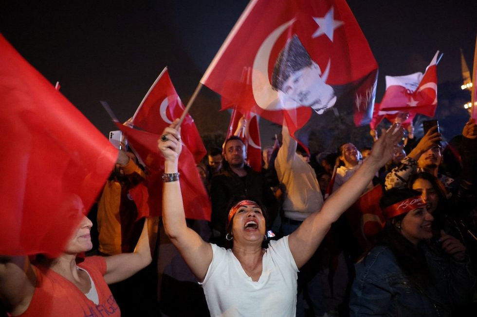 ​Supporters of Istanbul Mayor Ekrem Imamoglu, mayoral candidate of the main opposition party, celebrate in front of the Istanbul Metropolitan Municipality in Istanbul, Turkey, on March 31, 2024. 