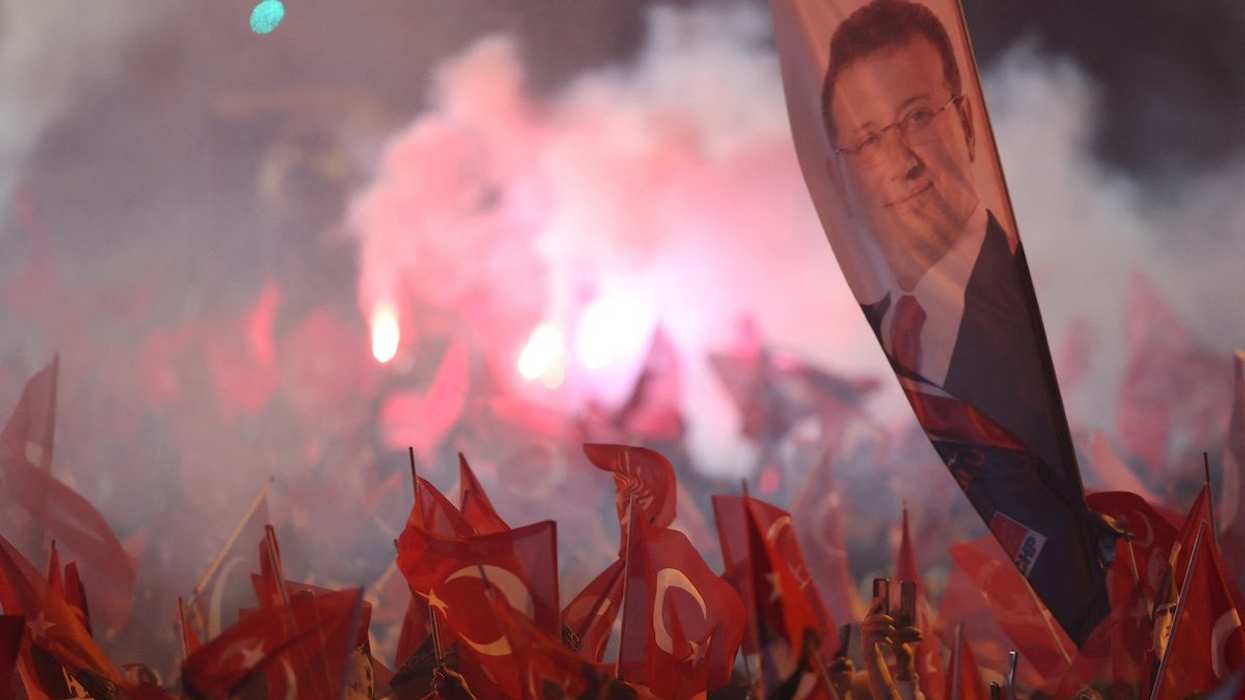 Supporters of Istanbul Mayor Ekrem Imamoglu, mayoral candidate of the main opposition Republican People's Party (CHP), celebrate following the early results in front of the Istanbul Metropolitan Municipality (IBB) in Istanbul, Turkey March 31, 2024.