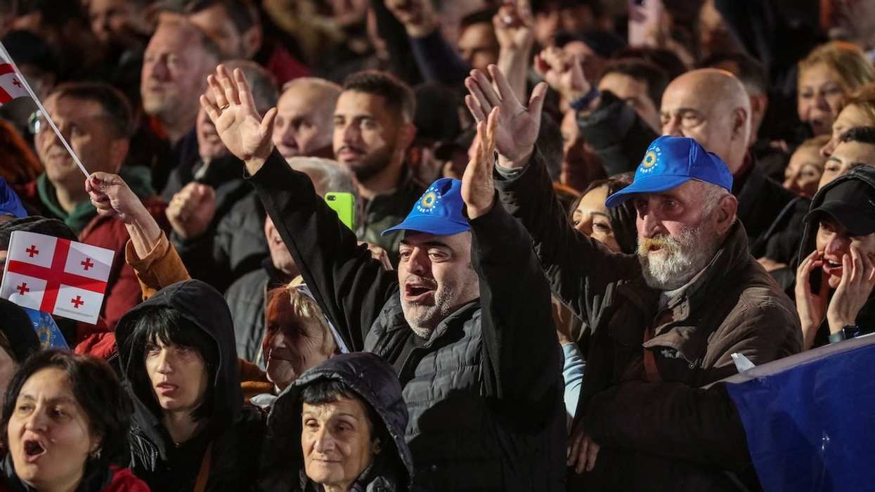 Supporters of the Georgian Dream party attend a final campaign rally ahead of the upcoming parliamentary elections in Tbilisi, Georgia October 23, 2024.