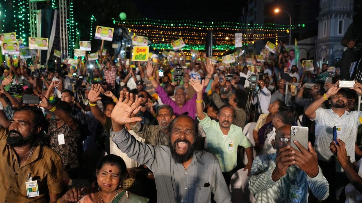 Supporters react during an election campaign rally for Sajith Premadasa, leader of the Samagi Jana Balawegaya (SJB) party, ahead of the presidential election, in Colombo, Sri Lanka September 18, 2024.