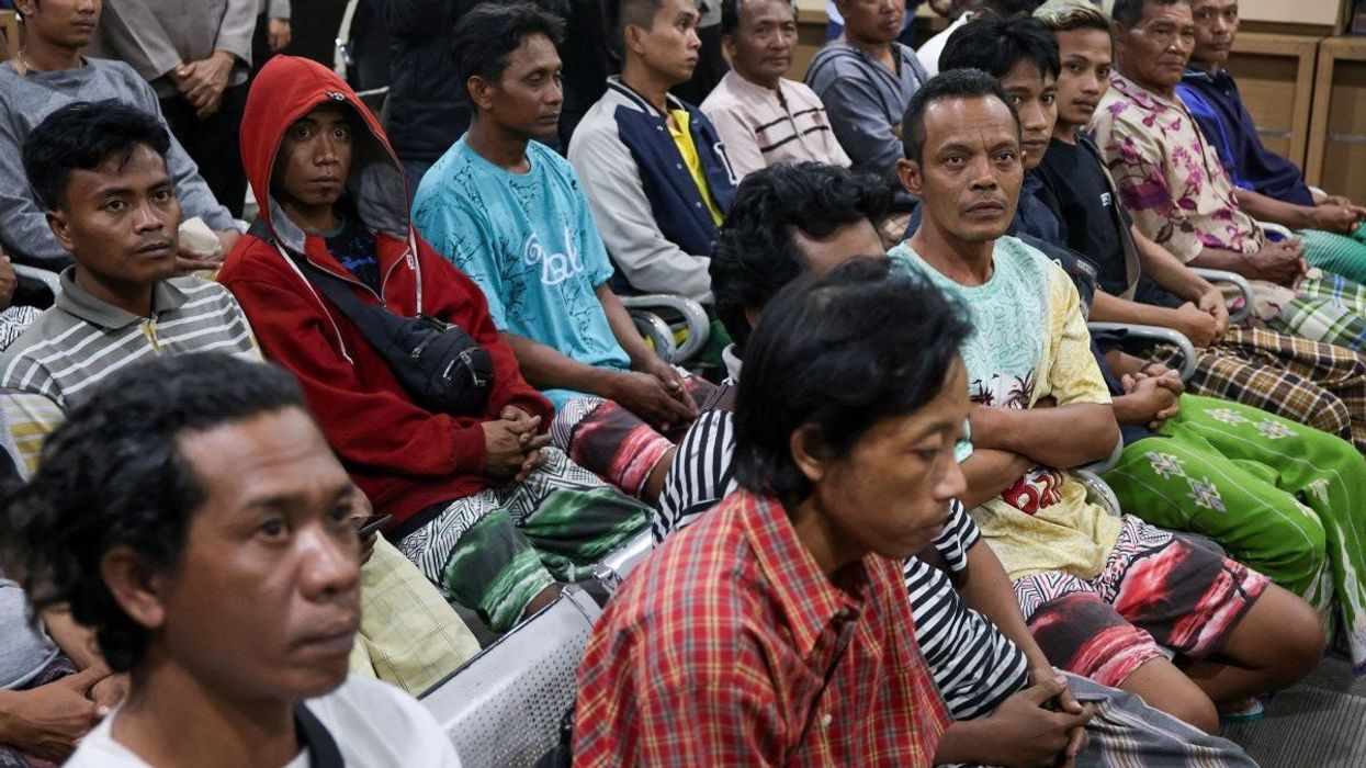 Survivors of the KMP Tunu Pratama Jaya ferry sinking wait to be identified by officers at Gilimanuk port, after the ferry carrying 65 people sank near the Indonesian island of Bali, in Bali, Indonesia, July 3, 2025.