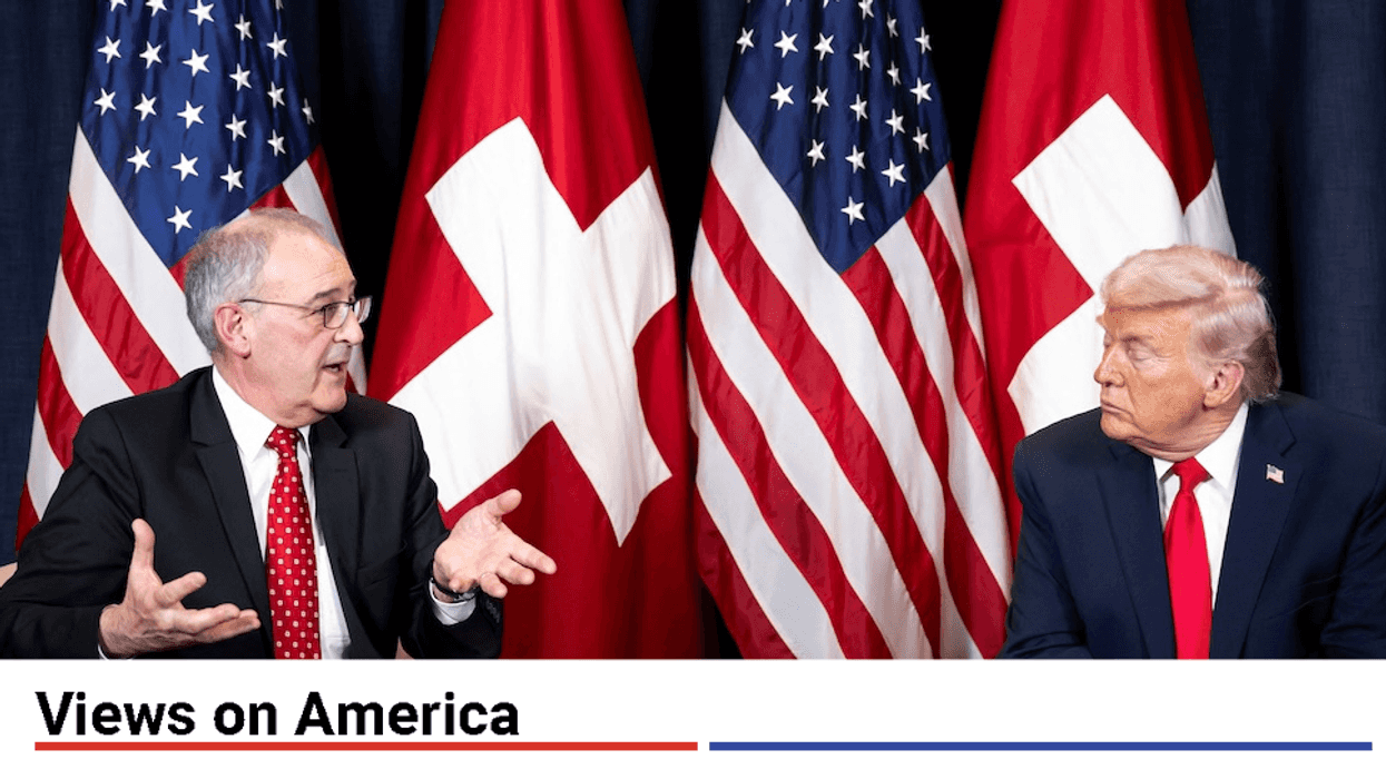Switzerland's Federal President Guy Parmelin speaks with US President Donald Trump prior to a bilateral meeting in Congress Centre on the sideline of the 56th annual meeting of the World Economic Forum, WEF, in Davos, Switzerland, Wednesday, January 21, 2026.