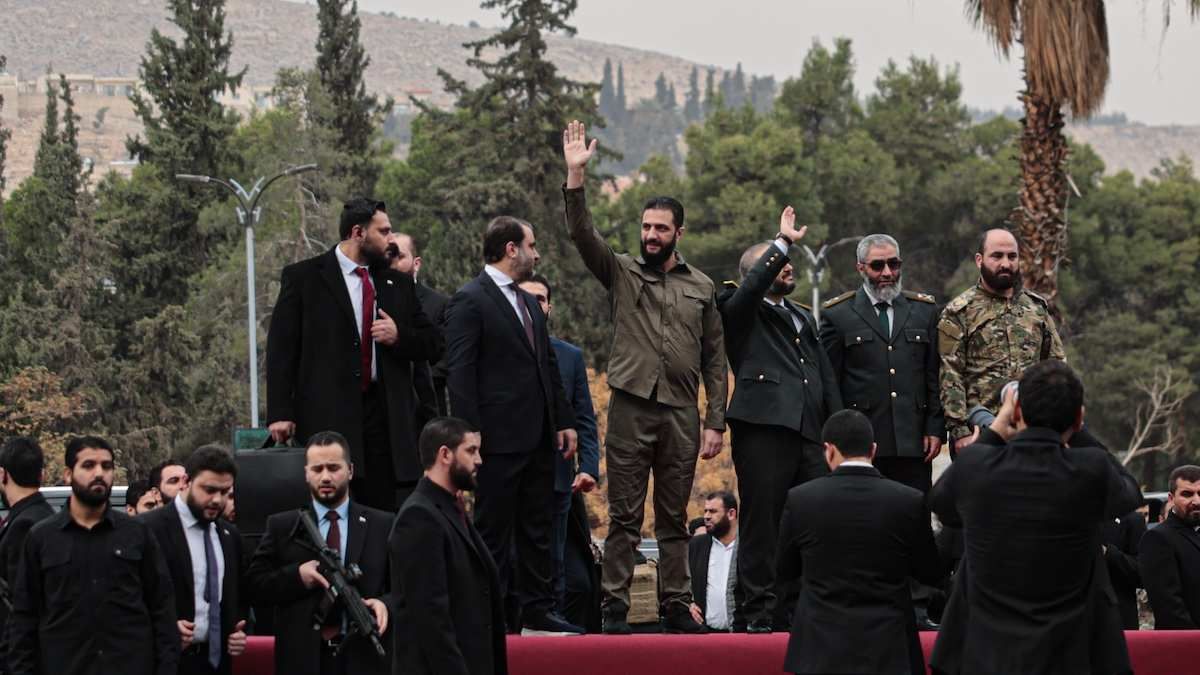 ​Syrian President Ahmed al-Sharaa celebrates the one-year anniversary of the fall of the Assad regime in Umayyad Square in central Damascus, on Dec. 8, 2025.