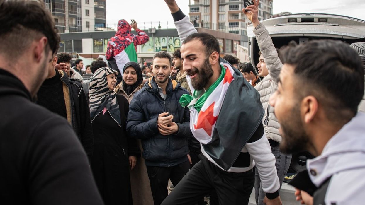 Syrian refugees in Ankara, Turkey, celebrate the fall of Syrian President Bashar al-Assad on Dec. 8, 2024.