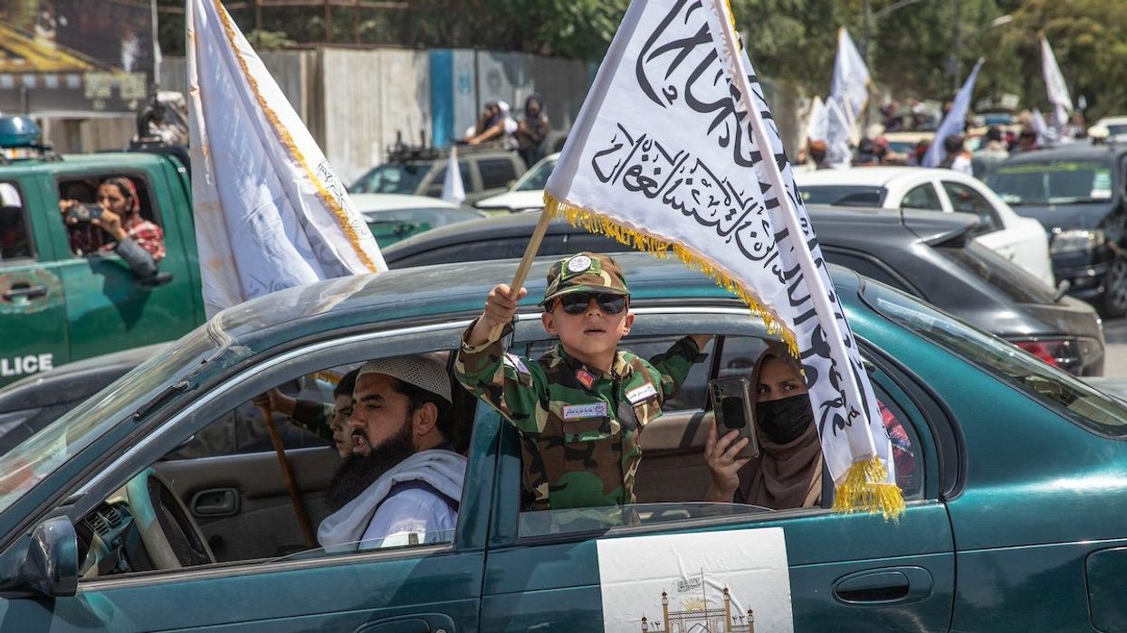 Talibans and their supporters gather in front of the American embassy in Kabul, Afghanistan, August 14, 2024, to celebrate the 3rd anniversary of the take over. They decided to celebrate according to the Afghan calendar.