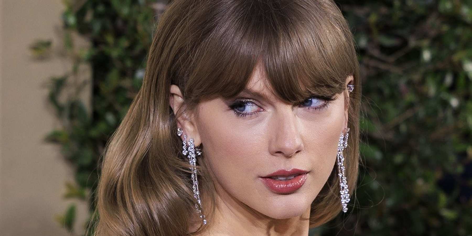 Taylor Swift arrives at the 81st Annual Golden Globe Awards in Los Angeles.