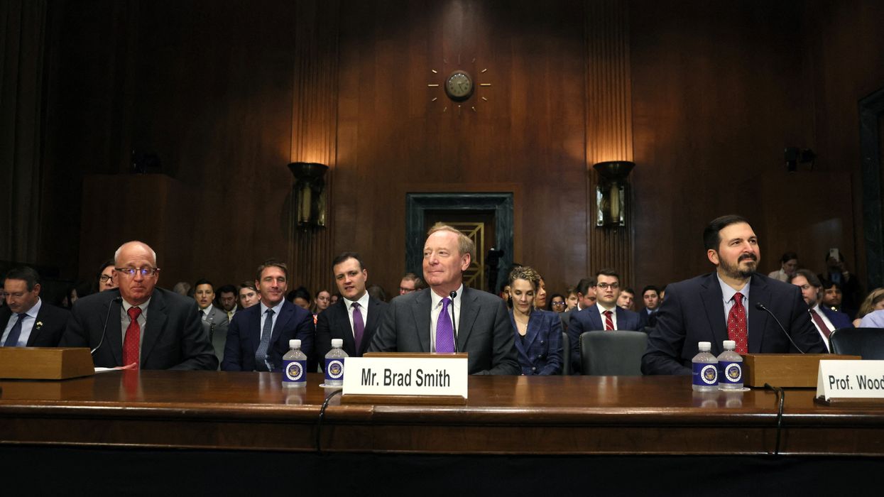 Tech leaders testifying on Capitol Hill.