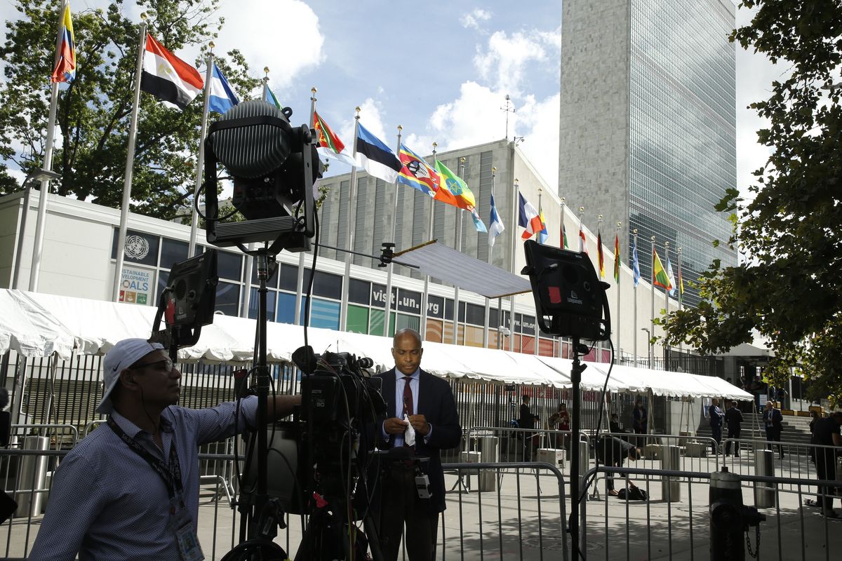 Television media broadcast commentaries as delegates arrive to the United Nations 76th General Assembly amid protests on September 21, 2021 in New York City, USA.