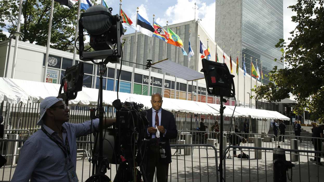 Television media broadcast commentaries as delegates arrive to the United Nations 76th General Assembly amid protests on September 21, 2021 in New York City, USA.