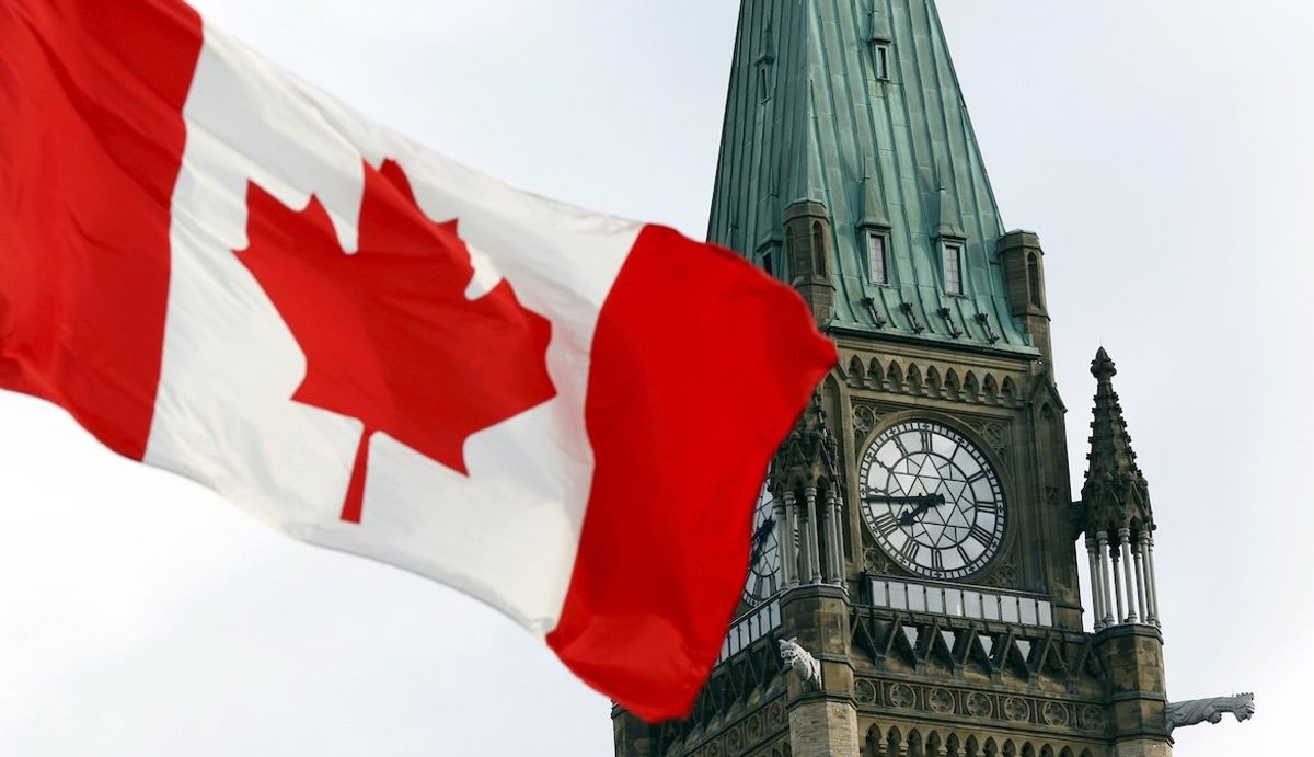 The Canadian flag flies on Parliament Hill in Ottawa. 