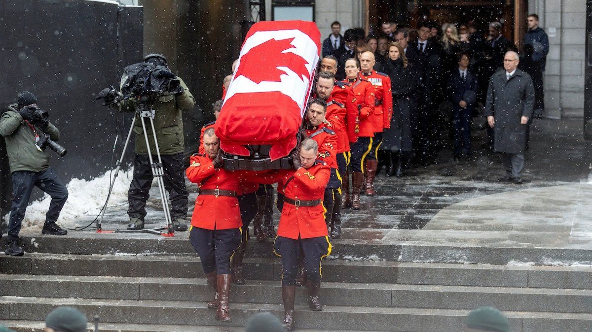 The casket of late former Canadian Prime Minister Brian Mulroney is carried by pallbearers following his state funeral at the Notre-Dame Basilica of Montreal, Quebec, Canada March 23, 2024. 