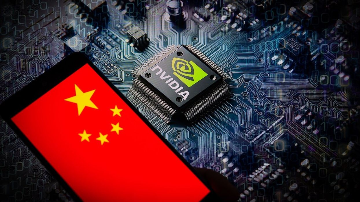 The flag of China is displayed on a smartphone with a NVIDIA chip in the background in this photo illustration.