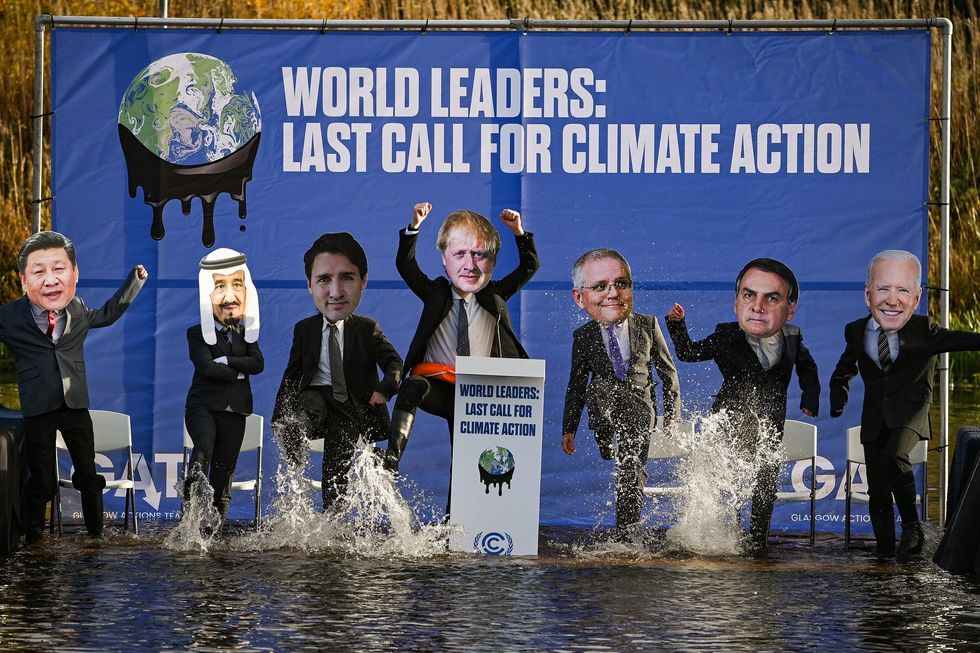 The Glasgow Actions Team activists dress as world leaders. 